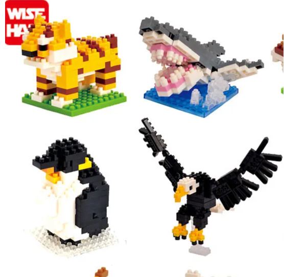 Discover the Mini Nano Micro Diamond Animal Building Blocks, offering finely detailed models: a tiger on grass, a shark above water, a penguin on snow, and a bird in flight. Ideal for sparking creativity and educational fun!.