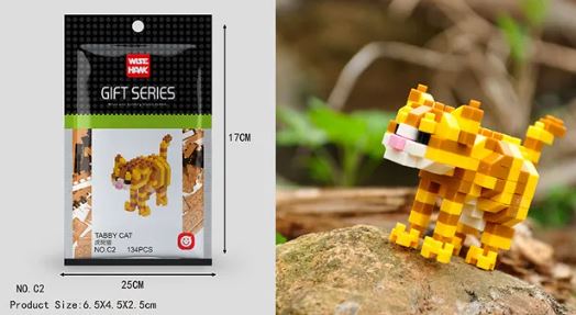 A compact package labeled Tabby Cat contains Wisehawks Mini Nano Micro Diamond Animal Building Blocks, featuring an assembled cat model on the right. The box details show the yellow and orange tabby cat standing on a rocky base.