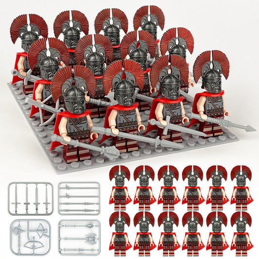 A 12 Piece Minifigure Roman Soldiers set features miniature warriors in red-plumed helmets on a grey baseplate, with spears and weapons displayed below—ideal as a Christmas stocking filler for history enthusiasts.