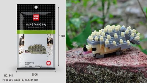The Mini Nano Micro Diamond Animal Building Blocks packaging, labeled ‘Wise Hawk,’ features a hedgehog with dimensions and piece count details. A small, assembled hedgehog toy rests on a rock surface, ideal for fine motor skill development.