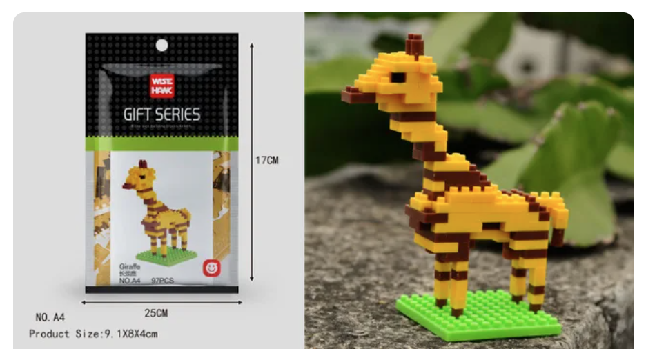 A small giraffe model from Mini Nano Micro Diamond Animal Building Blocks stands on a grassy base next to its packaging, which features a similar giraffe image labeled Wise Hawk Gift Series, along with dimensions and piece count, against a backdrop of lush green leaves.
