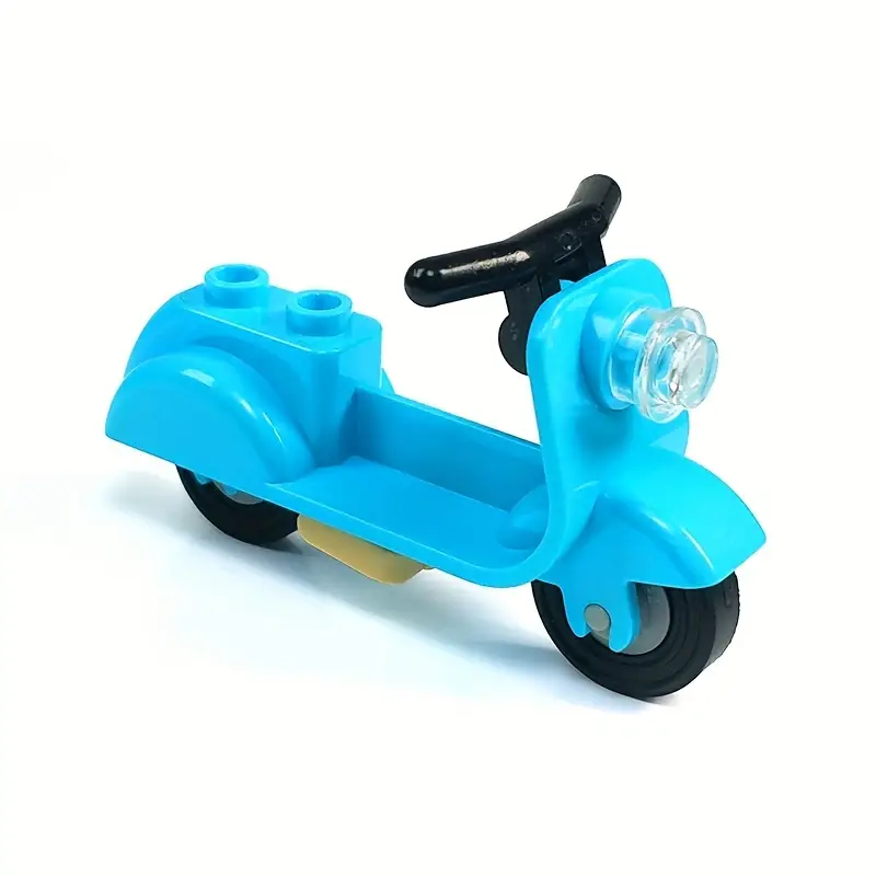 The Minifigure Moped in blue offers endless adventures with its interlocking plastic bricks, black handlebar, clear circular headlight, and two wheels. This playful design is perfect for tiny vehicle enthusiasts. Choose from four colors for your miniature adventure!.