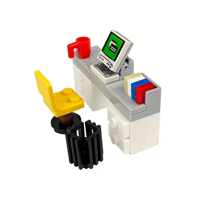 The Minifigure Computer Desk Furniture set includes a LEGO desk setup with a green-screen computer, red mug, two books, and a yellow chair. The scene is completed with Minifigure Furniture and a black wastebasket on a white desk with gray accents, ideal for any modern home.