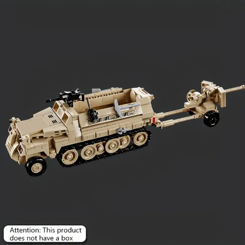 A black and tan toy military half-tracked armored vehicle is connected to an artillery piece, detailed against a gray background. A note on the bottom left warns, Attention: This product does not have a box.