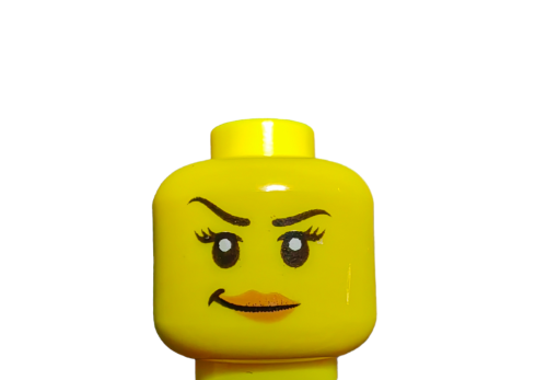 A close-up of the LEGO 6174813 Minifigure Head, featuring lipstick, arched eyebrows, wide eyes with lashes, and a smirk. This detailed yellow head showcases personality against a plain white background.