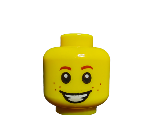 The LEGO 6121896 Minifigure Head offers a dual-faced design, featuring one side with a cheerful expression of large eyes, thin eyebrows, and freckles, sparking storytelling through its simple cartoon-like charm.