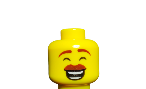 Close-up of the LEGO 6226749 Minifigure Head featuring a thick reddish-brown mustache, smiling face, closed eyes, and raised eyebrows, capturing cheerful emotions against a plain white background.
