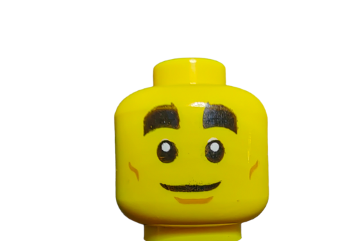 A close-up of the yellow LEGO 6271407 Minifigure head features a smiling face with thick black eyebrows and sunglasses, perfect for enthusiasts seeking classic charm against a white background.