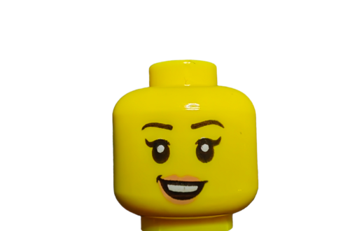 Close-up of a yellow LEGO 6270320 minifigure head with an open mouth smile, nougat lips, bright eyes, and curved black eyebrows. Background is plain white.