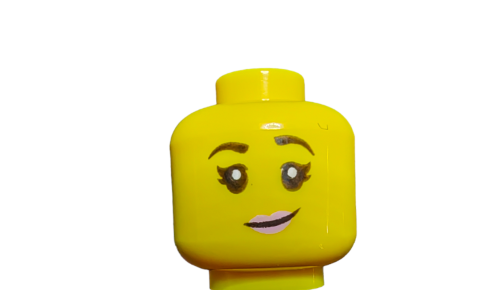 Close-up of LEGO 6296328 Minifigure Head, featuring a dual-sided female face with a smiling expression, large eyes, eyelashes, and pink lips against a plain white background.
