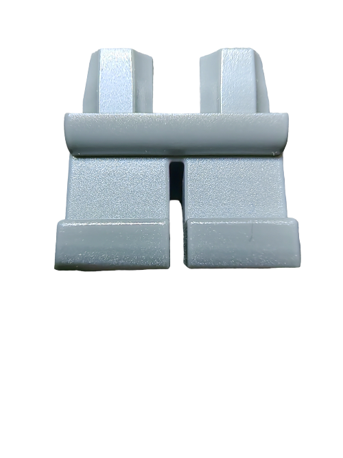 Close-up of LEGO® 6233908 Minifigure Legs, Short Grey Legs - UB1169; a plastic object featuring two vertical prongs, a flat base, and a simple geometric design set against a white background—ideal for building adventures.