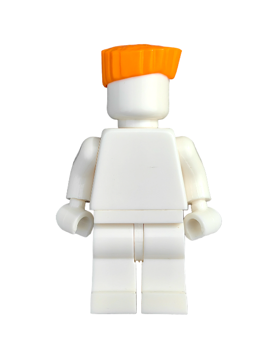 A white LEGO minifigure featuring the orange Wig, Orange Hair Flat Top (LEGO 6421684 - UB1247), stands on a plain background. It has a blank face and block limbs, showcasing classic LEGO design.