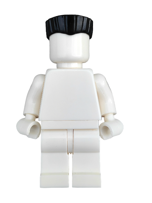 A LEGO 6399881 toy features a white building block figure with a black hair flat top wig, standing on a stark white background. The minifigure has no facial features or clothing details, offering a minimalistic appearance.