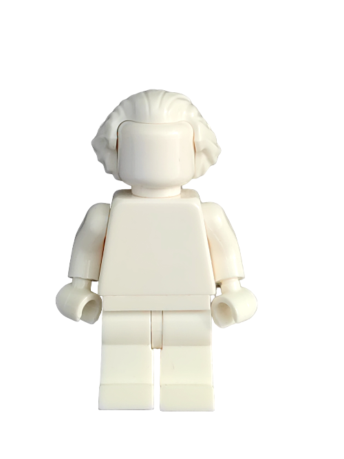 A LEGO 6334236 minifigure, featuring a white swept-back peak hairstyle and bushy back, stands against a clean white background.