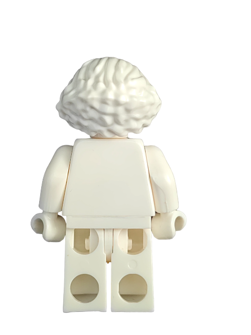 The back of a LEGO minifigure showcases the 6334236 Wig with white, swept-back hair featuring a peak and bushy design, standing against a plain white backdrop.
