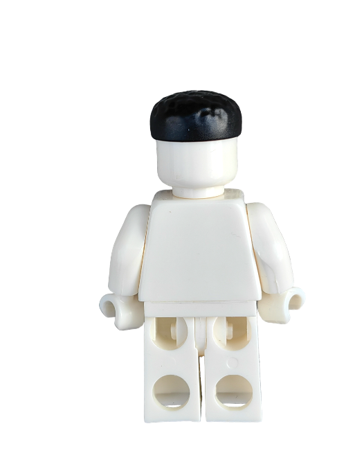 A white, featureless toy figure with rounded edges stands upright, wearing a LEGO 6356860 Wig—black hair with flat sides and short on top. The background is plain white.