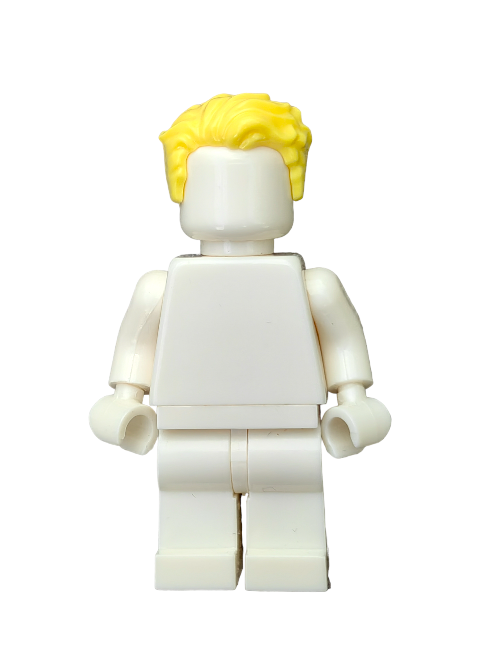 A white LEGO minifigure, featuring the customizable LEGO 6151874 Wig with yellow hair swept left and short sideburns, stands against a plain white background, ready for your creative touch. With no facial features or clothing details, its a blank canvas for your imagination.
