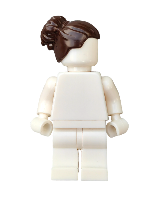 A white Lego minifigure featuring the LEGO 6158322 wig with a large bun of dark brown hair stands on a white background, without facial features or additional details.