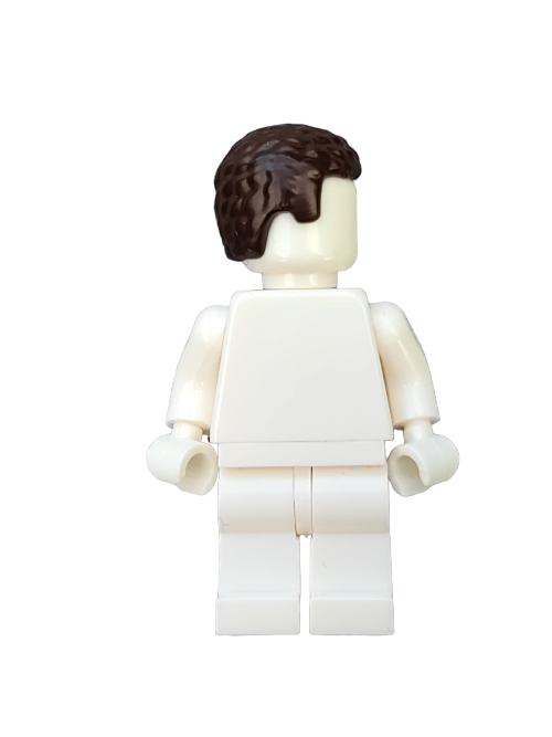 The LEGO 6373083 minifigure features a plain white body with coiled dark brown hair, facing away from the viewer. It stands against a white background and is ideal for enhancing any dedicated minifigure collection.