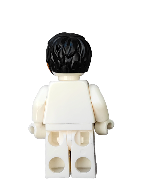 A LEGO minifigure is seen from behind, donning the LEGO 6288031 Wig with black hair brushed to one side and orange highlights, dressed in a crisp white outfit against a plain background.