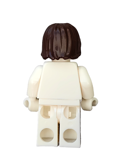 A LEGO minifigure with medium-length dark brown hair (Product Name: LEGO 4568934 Wig, Dark Brown Hair Medium Length with Middle Parting - UB1311) stands against a white background, highlighting its unique hairstyle.