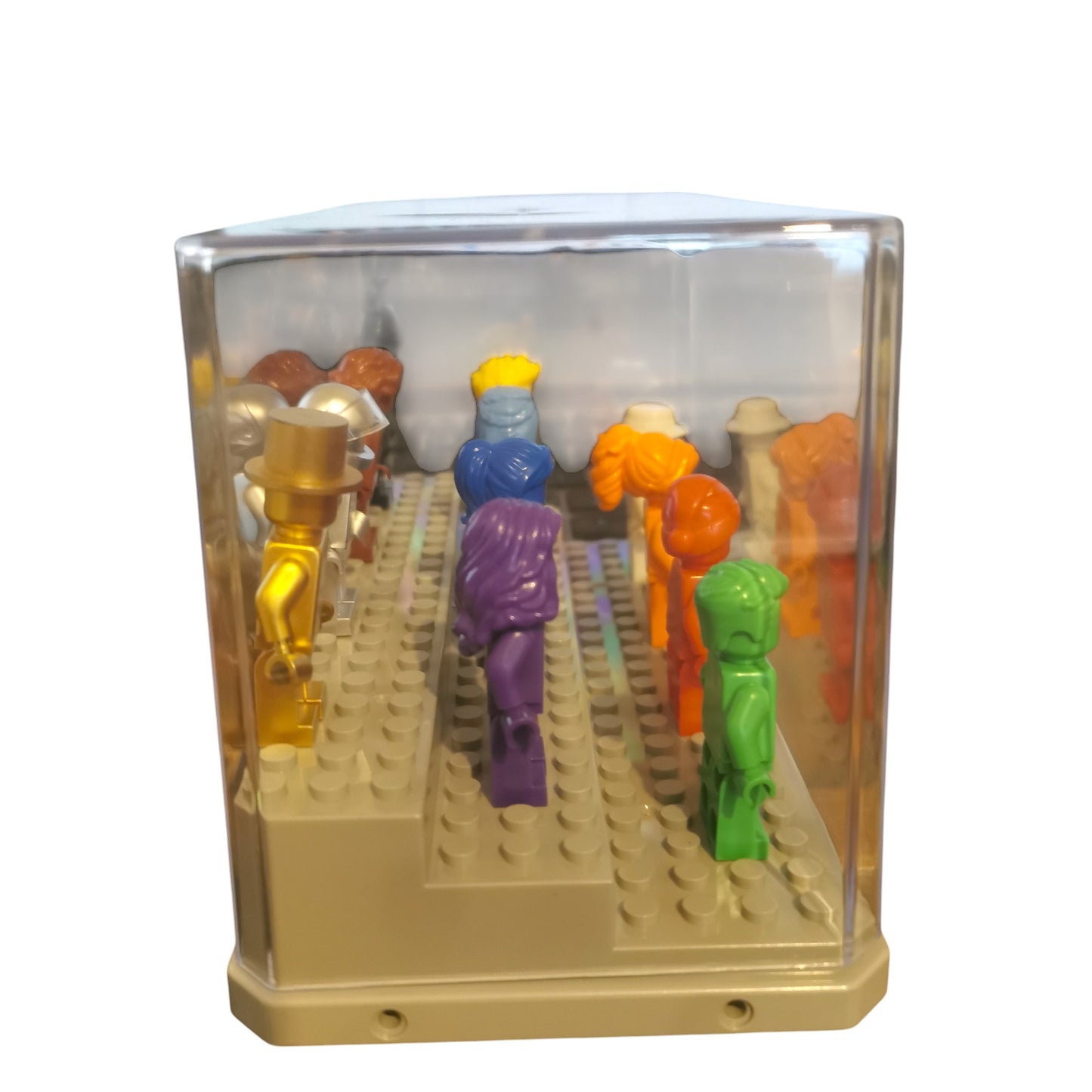 The Vibrant Colour Minifigures with Display Case showcases 12 eye-catching LEGO minifigures in gold, purple, orange, green, and blue arranged neatly against a white backdrop.