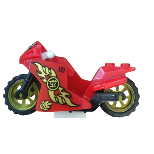 The Minifigure Bikes for Racing set features a red toy motorcycle made from interlocking bricks, complete with flame decals and gold wheels. Its sleek, streamlined design and black tires make it stand out against a plain backdrop, capturing the excitement of intense races.