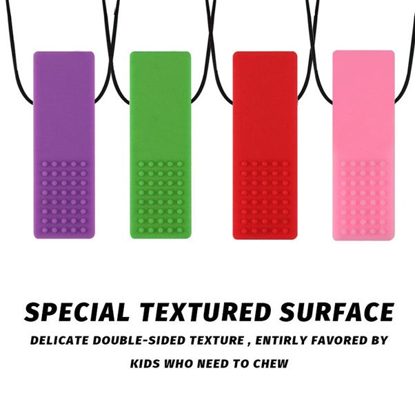 The Sensory Chew Necklace features four rectangular pendants in rainbow shades of purple, green, red, and pink on black cords. Each pendant has a textured section with raised dots and text that reads: Special Textured Surface and Delicate double-sided texture entirely favored by kids.