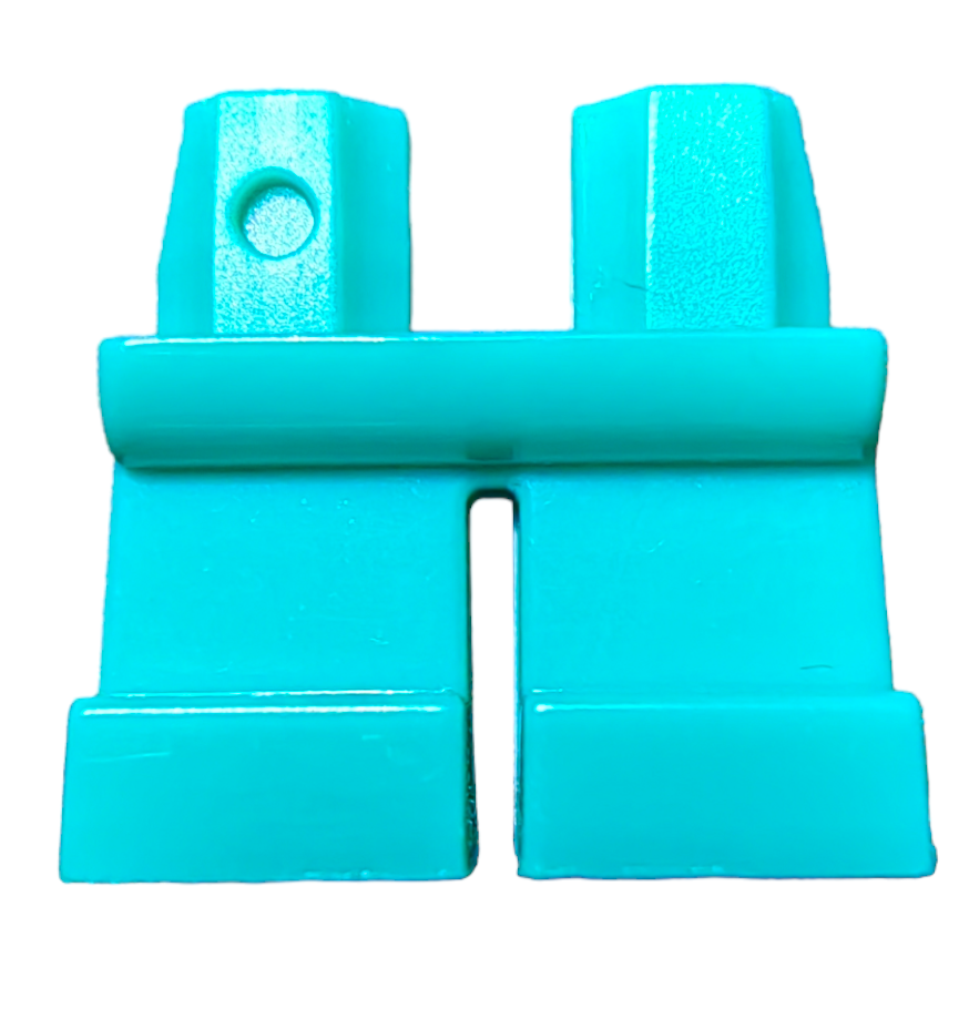 The product SHORT LEGS is a turquoise, abstract plastic piece featuring geometric shapes, a round indentation, and straight edges that resemble part of a puzzle or construction set.