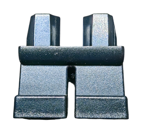 Close-up of SHORT LEGS, a pair of small, dark grey plastic pieces shaped like legs for a toy figure or construction set. Each leg is detailed with blocky shapes and features a rectangular connector on top.