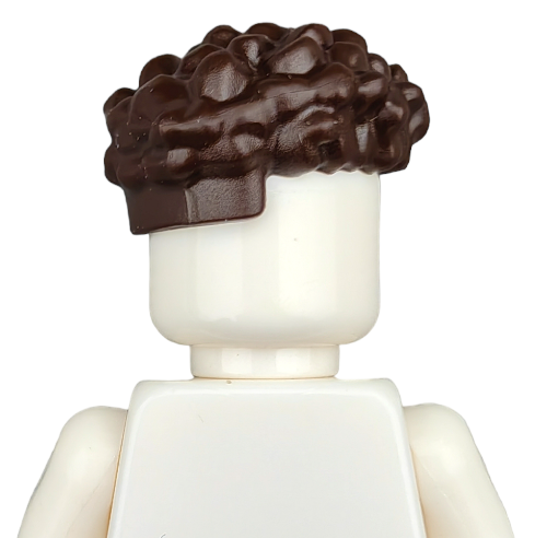 A clear image depicts the upper body of a Lego figure with a cream head and torso, donning textured brown hair. Featured against a white backdrop, this view highlights the BROWN WIGS product.