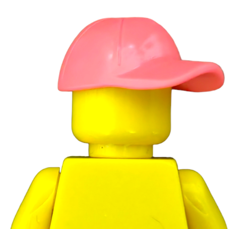 The LEGO 6353770 set features a yellow minifigure with a vibrant coral cap facing forward, depicted from the back against a stark white background.