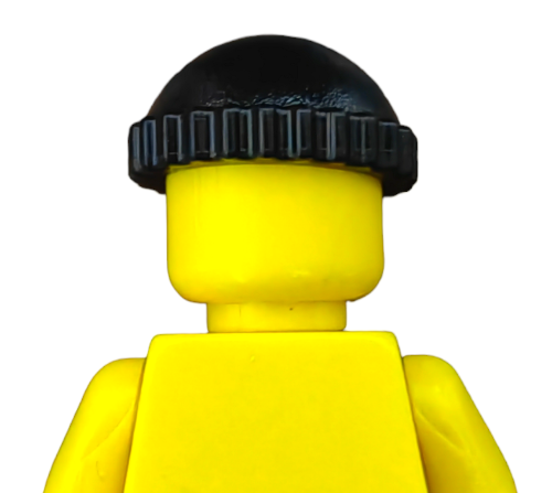 A LEGO 4157108 figure with a plain block head and no details wears a black knit cap styled like a mini pixie cap, viewed from the back against a white background.