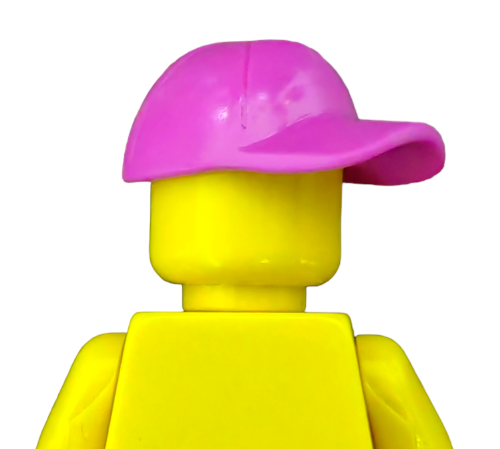 The LEGO 6388194 minifigure, featuring a vibrant pink cap UB1379, stands with its back turned against a stark white background.