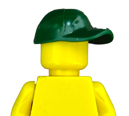 A yellow LEGO Minifigure sports a DARK GREEN CAP (LEGO 6217106) with no facial features, its minimalist design standing out against a plain white background.