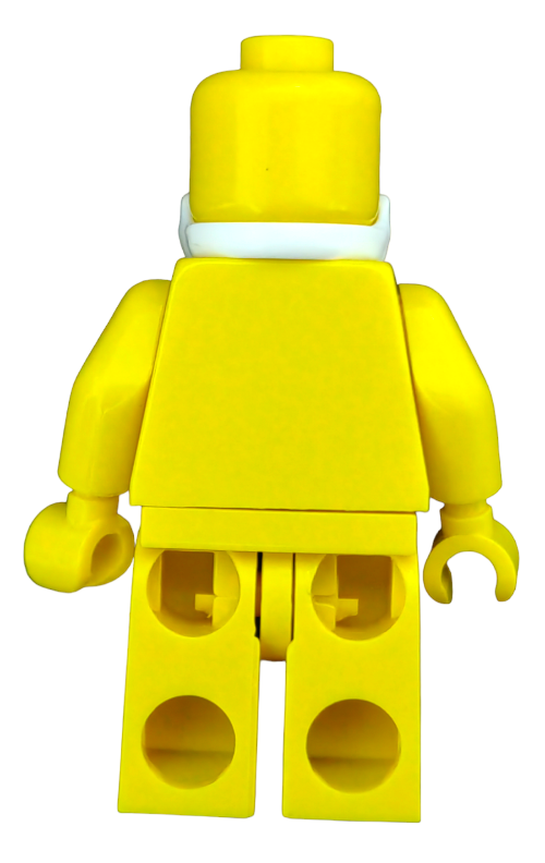 A yellow blocky plastic toy figure is shown from the back, featuring a cylindrical head, faceless design, simple body, and movable limbs. Ideal for custom Minifigs, it has a neck sporting a white band to attach accessories like the LEGO Long White Beard - UB1385.