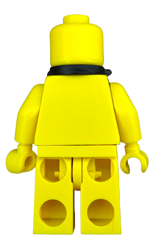 A yellow LEGO 6269933 minifigure, with no facial features, viewed from behind has a black scarf and interlocking plastic bricks.