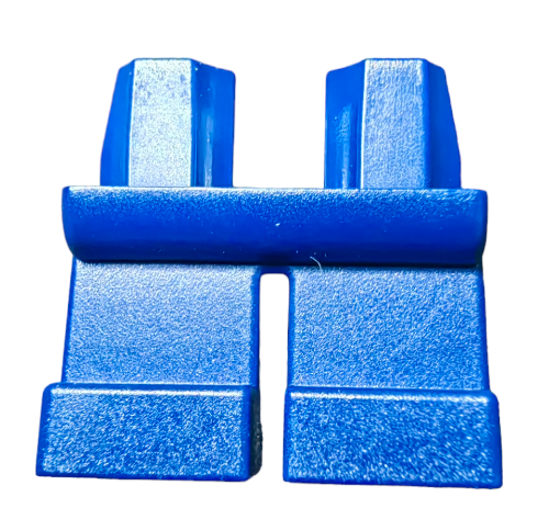 Close-up of a blue plastic SHORT LEGS piece resembling a Lego minifigures legs, divided into two sections with a connecting bar on top and a slightly textured surface, isolated on a white background.