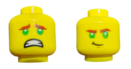 The LEGO 6313216 Minifigure Head, Double Face Green Eyes - UB1022 set includes two yellow minifigure heads. One head shows a worried grimace with furrowed brows, while the other displays a confident smile with raised brows. Both feature striking green eyes, ideal as unique minifigure accessories.