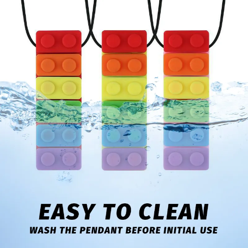 The Sensory Chew Necklace features three colorful silicone block pendants that float in water, ideal as oral sensory aids for autistic children, boys and girls with ADHD. These rainbow toys are easy to clean; remember to wash them before initial use. Made from food-grade safety silicone.
