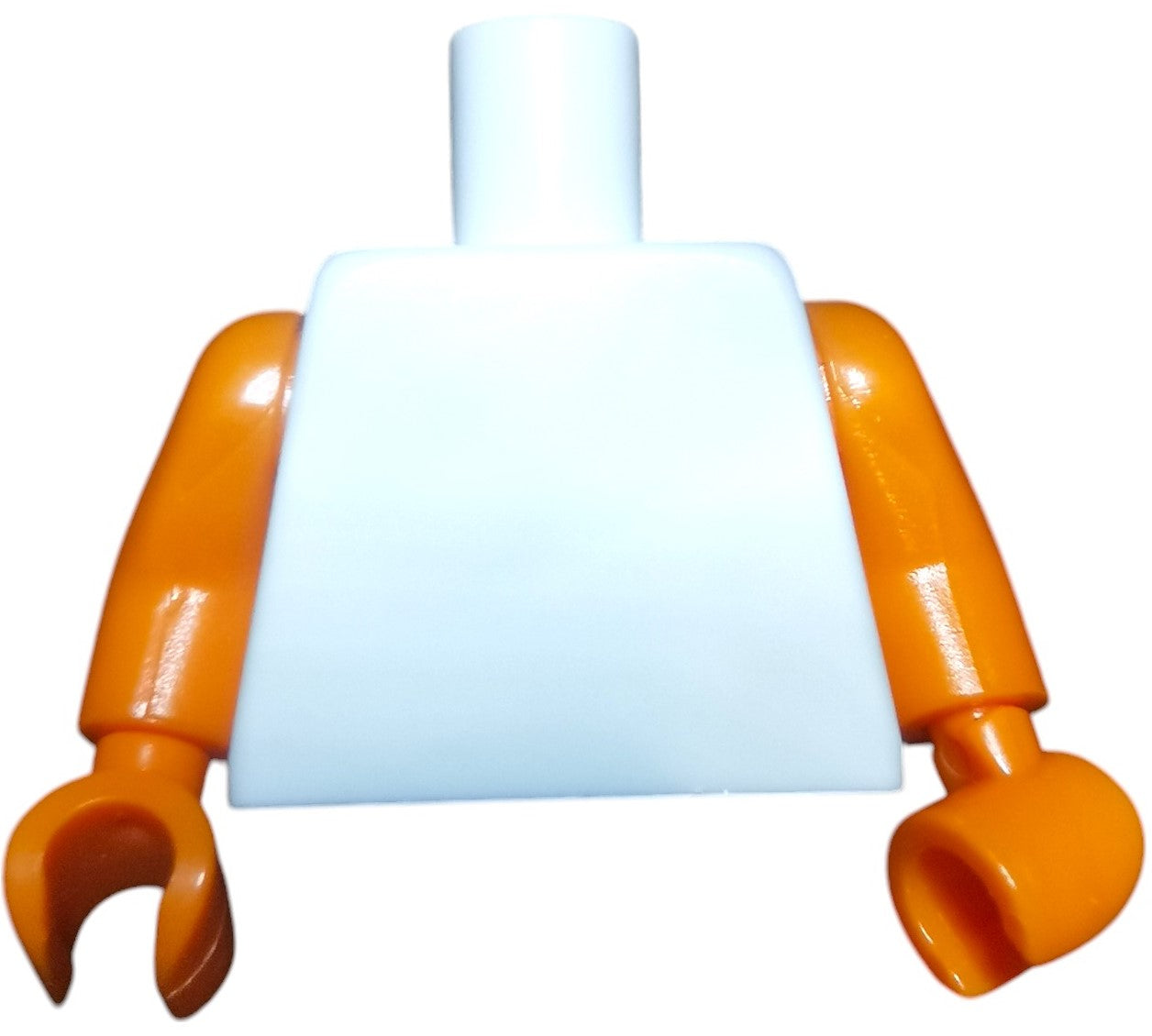 A close-up of a Minifigure Keyring Torsos shows its orange arms and white body, with claw-like curved hands and a featureless cylindrical neck without a head.