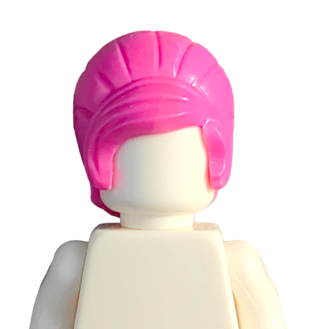 A LEGO figure features an eye-catching bright pink updo, lacks facial features, and is dressed in a simple, light-colored torso. The product is COLOURED WIGS against a solid white background.