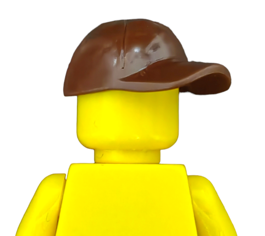 The PRODUCT HATS AND HOODIES features a Lego minifigure with a featureless yellow face, donning a sideways brown cap. Viewed from the back against a plain white backdrop.