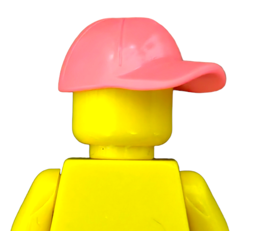 A yellow plastic toy figure from the PRODUCT HATS AND HOODIES line, wearing a pink baseball cap and lacking facial features, is displayed from behind on a white background.